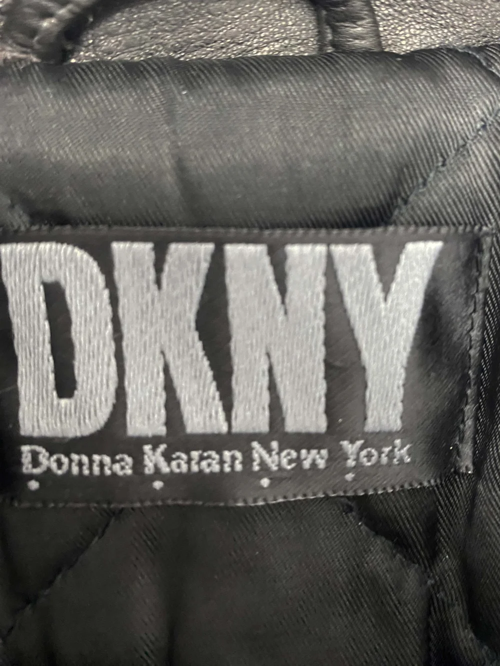 DKNY 90s black leather padded coat — JAMES VELORIA